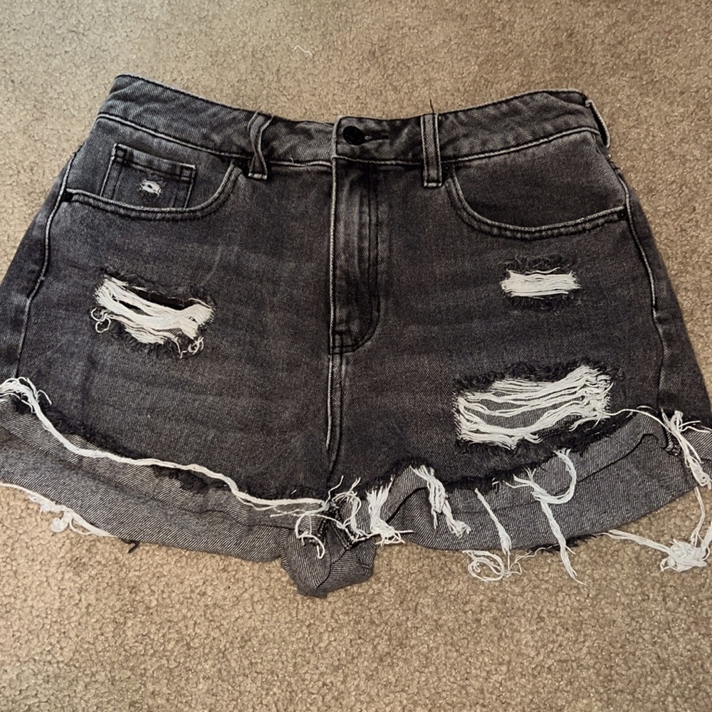 I am selling these washed black jean shorts.